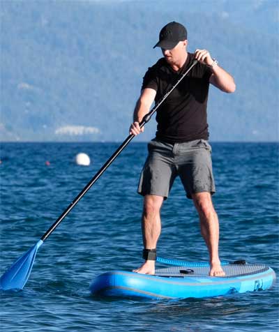 Man Paddling on Gili Inflatable Paddleboard